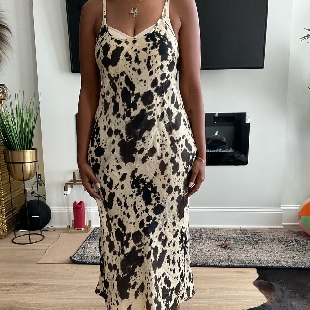 Cream and black strapless with black out long lose body dress from Zara